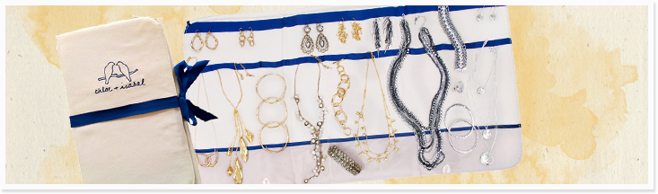 Chloe and Isabel jewelry laid out in a beautiful tablescape