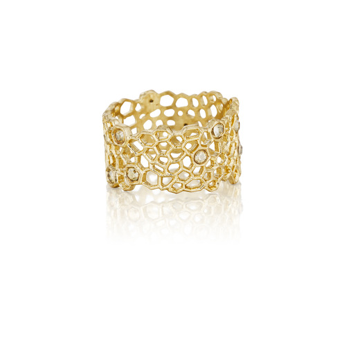 Golden Honeycomb Ring on a white background